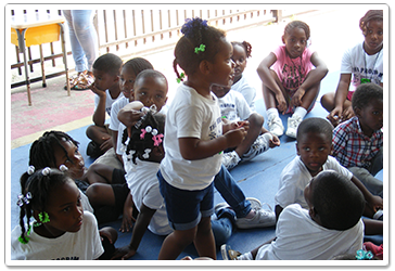 Little Children Sitting Outside