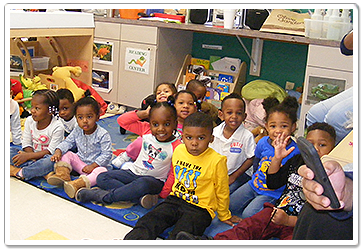 Kids Sitting on Floor Mat